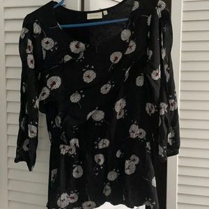 Anthropologie black floral peplum top